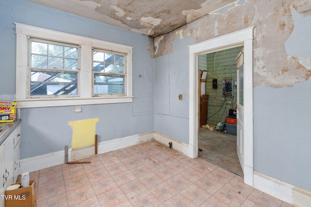 1411 E Unaka Ave, Johnson City, TN 37601 - empty room with brick patterned flooring