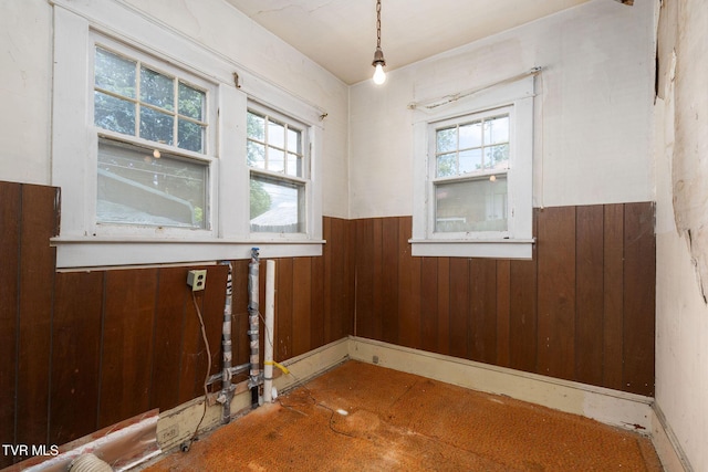 1411 E Unaka Ave, Johnson City, TN 37601 - unfurnished room featuring a wainscoted wall and wooden walls