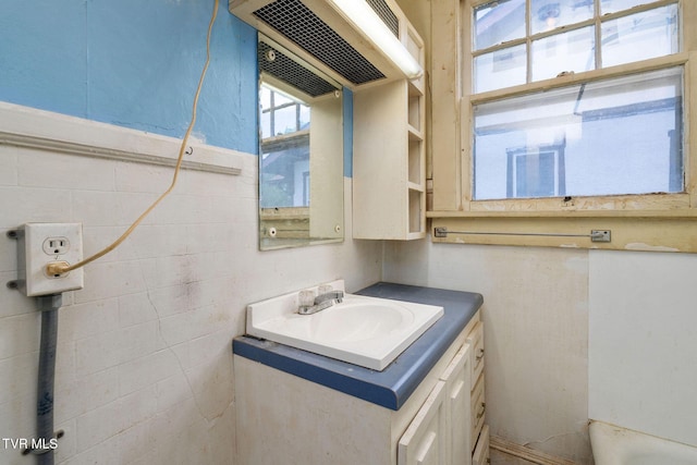 1411 E Unaka Ave, Johnson City, TN 37601 - bathroom featuring vanity and tile walls