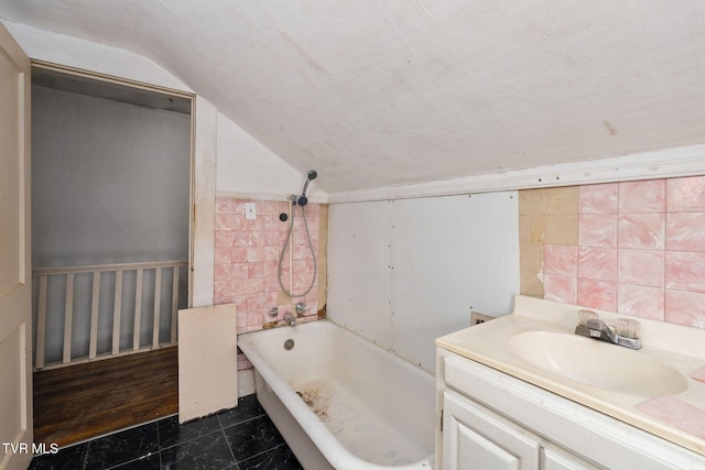 1411 E Unaka Ave, Johnson City, TN 37601 - bathroom featuring vaulted ceiling, vanity, and tile patterned floors