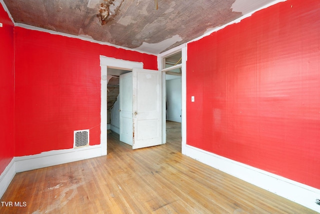 1411 E Unaka Ave, Johnson City, TN 37601 - spare room with wood finished floors and baseboards