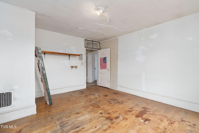 1411 E Unaka Ave, Johnson City, TN 37601 - unfurnished bedroom with wood-type flooring