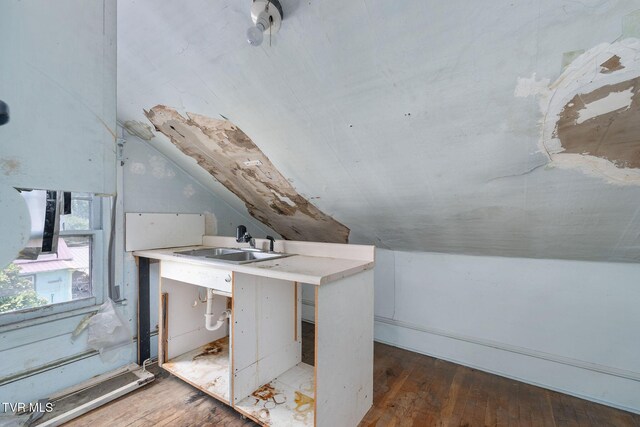 1411 E Unaka Ave, Johnson City, TN 37601 - bathroom with vaulted ceiling and hardwood / wood-style flooring
