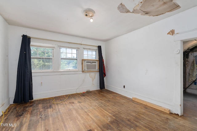 1411 E Unaka Ave, Johnson City, TN 37601 - spare room with cooling unit and wood finished floors