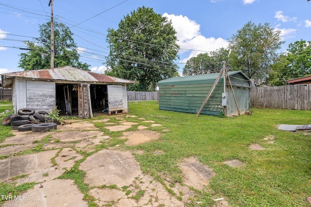 1411 E Unaka Ave, Johnson City, TN 37601 - fenced backyard with a storage shed