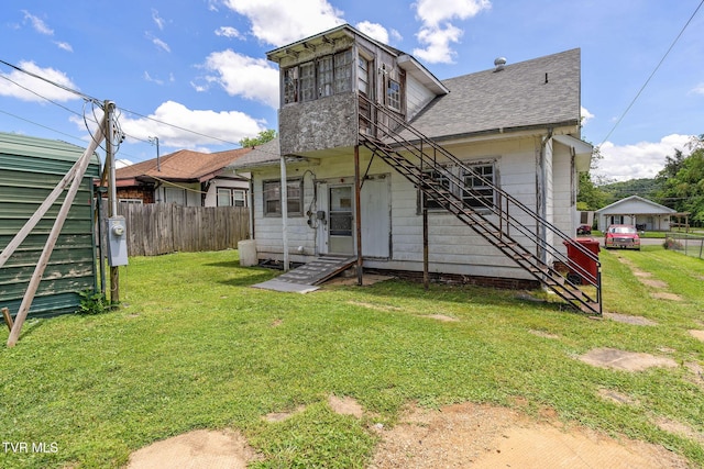 1411 E Unaka Ave, Johnson City, TN 37601 - rear view of property featuring stairs and roof with shingles