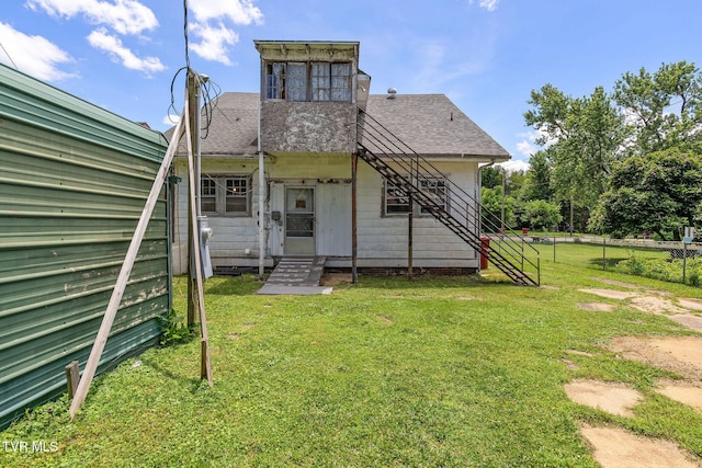 1411 E Unaka Ave, Johnson City, TN 37601 - back of property with stairway, a shingled roof, and entry steps