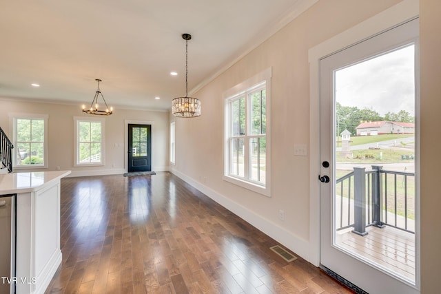 2009 Idle Hour Rd, Kingsport, TN 37660 - doorway with crown molding, a chandelier, dark wood finished floors, stairway, and recessed lighting