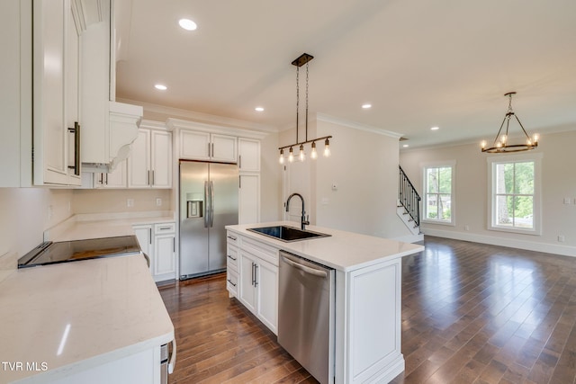 2009 Idle Hour Rd, Kingsport, TN 37660 - kitchen with stainless steel appliances, ornamental molding, dark wood-style floors, a chandelier, and hanging light fixtures