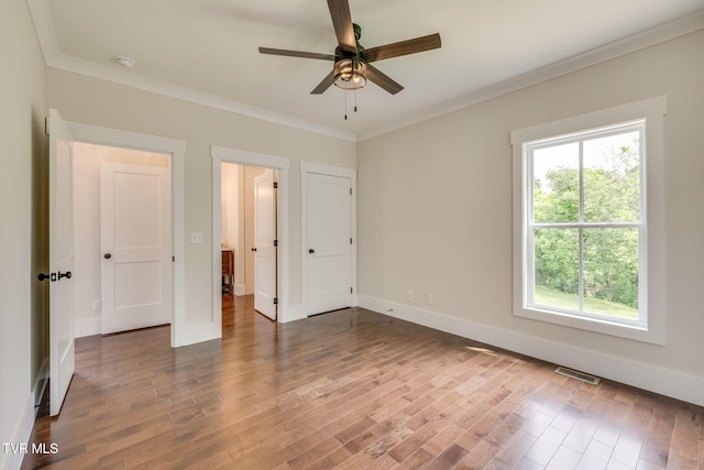 2009 Idle Hour Rd, Kingsport, TN 37660 - unfurnished bedroom featuring ornamental molding and wood finished floors