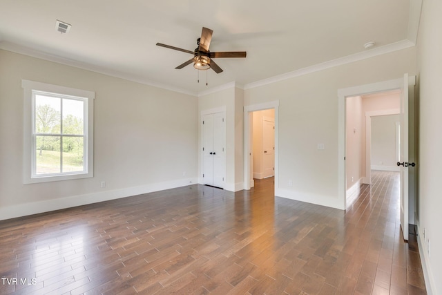 2009 Idle Hour Rd, Kingsport, TN 37660 - empty room featuring a ceiling fan, dark wood finished floors, ornamental molding, and a smoke detector