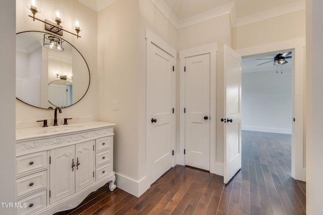 2009 Idle Hour Rd, Kingsport, TN 37660 - bathroom with ornamental molding, wood finished floors, vanity, and a ceiling fan
