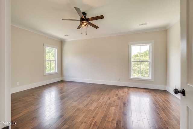 2009 Idle Hour Rd, Kingsport, TN 37660 - empty room featuring a ceiling fan, crown molding, and dark wood-style floors
