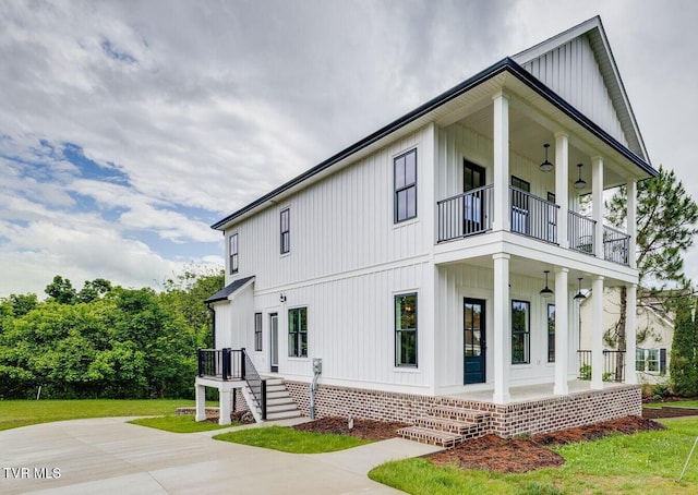 2009 Idle Hour Rd, Kingsport, TN 37660 - view of side of home with a balcony, a porch, and board and batten siding
