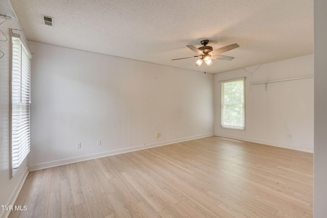 256 S Creek Ct, Kingsport, TN 37663 - unfurnished room featuring ceiling fan, a textured ceiling, and light wood finished floors