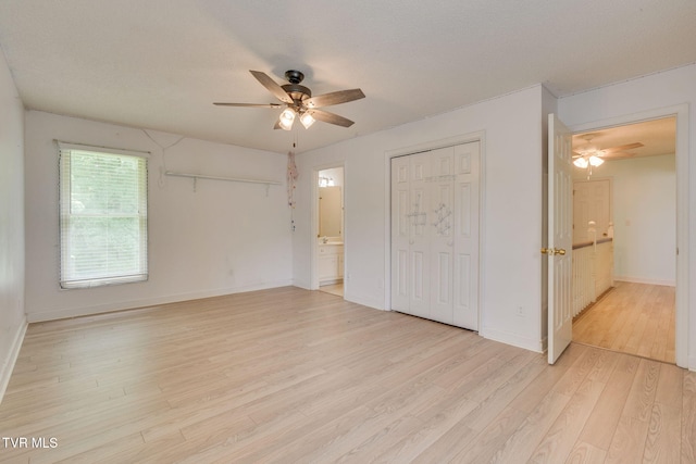 256 S Creek Ct, Kingsport, TN 37663 - unfurnished bedroom featuring light wood-style flooring, a ceiling fan, a closet, and ensuite bathroom