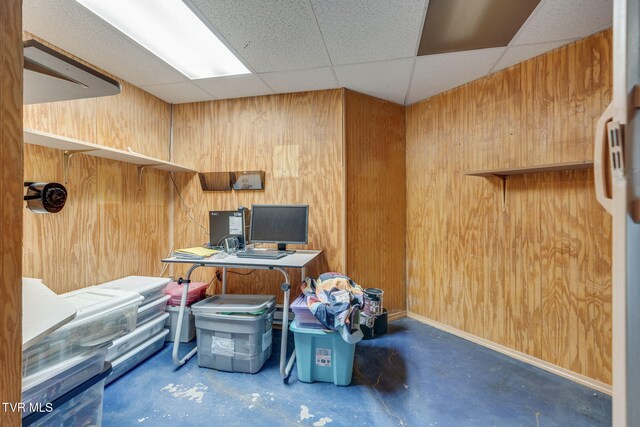 256 S Creek Ct, Kingsport, TN 37663 - home office featuring wooden walls, concrete flooring, and a drop ceiling