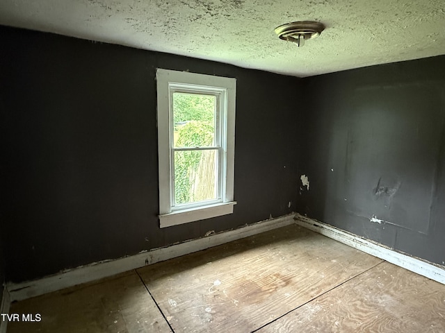1741 Dunlap St, Bristol, VA 24201 - unfurnished room featuring a textured ceiling