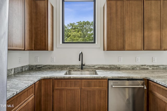 1533 Pactolas Rd Unit 107, Johnson City, TN 37604 - kitchen with dishwasher, light stone countertops, and brown cabinets
