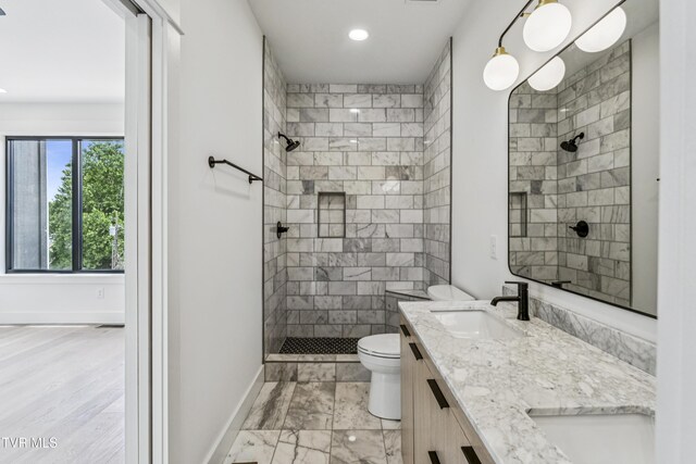 1533 Pactolas Rd Unit 107, Johnson City, TN 37604 - full bathroom with a tile shower, double vanity, recessed lighting, and marble finish flooring