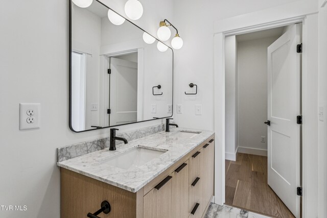 1533 Pactolas Rd Unit 107, Johnson City, TN 37604 - bathroom with double vanity and baseboards