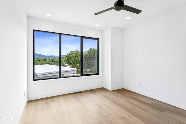 1533 Pactolas Rd Unit 107, Johnson City, TN 37604 - spare room featuring light wood-style floors, recessed lighting, a ceiling fan, and a mountain view
