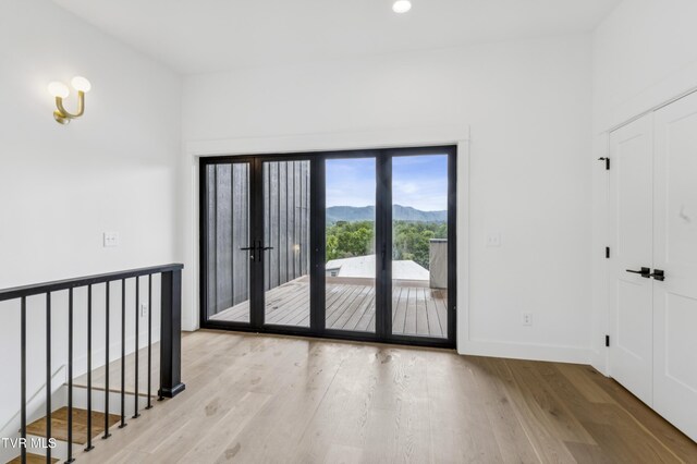 1533 Pactolas Rd Unit 107, Johnson City, TN 37604 - unfurnished room featuring light wood-style floors and a mountain view