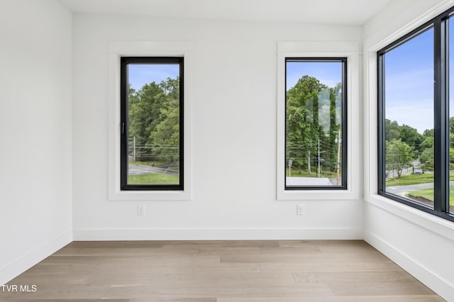 1533 Pactolas Rd Unit 107, Johnson City, TN 37604 - empty room with plenty of natural light and light wood-type flooring