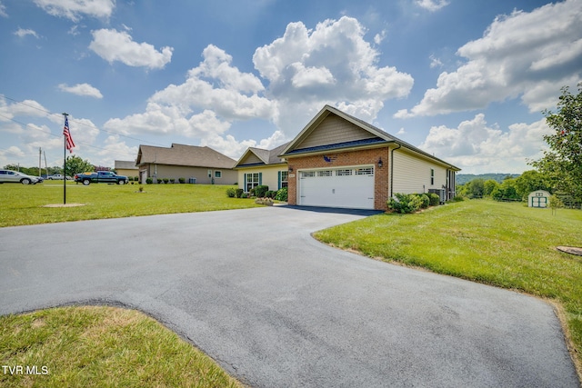 1645 Old Stagecoach Rd, Jonesborough, TN 37659 - view of front facade featuring brick siding, driveway, a front yard, and a garage