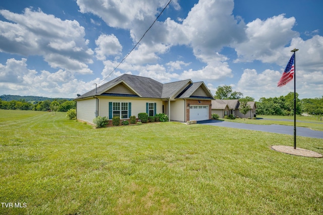 1645 Old Stagecoach Rd, Jonesborough, TN 37659 - view of front of house with asphalt driveway, a front lawn, and an attached garage