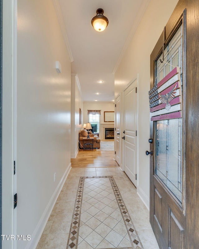1645 Old Stagecoach Rd, Jonesborough, TN 37659 - foyer entrance featuring ornamental molding, a glass covered fireplace, and inlaid floor details