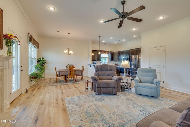 1645 Old Stagecoach Rd, Jonesborough, TN 37659 - living area featuring light wood-style floors, crown molding, ceiling fan, a chandelier, and recessed lighting