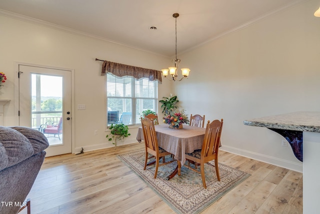 1645 Old Stagecoach Rd, Jonesborough, TN 37659 - dining room with a chandelier, crown molding, and light wood-style floors