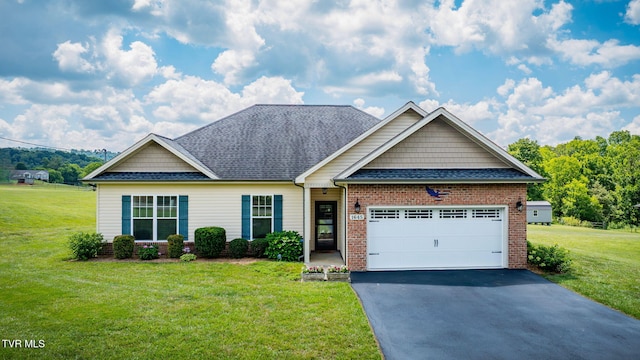 1645 Old Stagecoach Rd, Jonesborough, TN 37659 - view of front facade with a shingled roof, a front lawn, an attached garage, and driveway