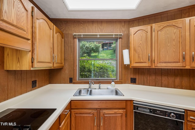 22627 Montego Bay Rd, Abingdon, VA 24211 - kitchen featuring black appliances, light countertops, and wooden walls