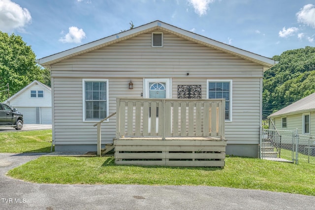 2642 Broad St, Bristol, TN 37620 - bungalow with a wooden deck and a garage