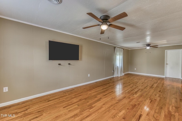 2642 Broad St, Bristol, TN 37620 - unfurnished room with a ceiling fan, light wood-style flooring, and crown molding