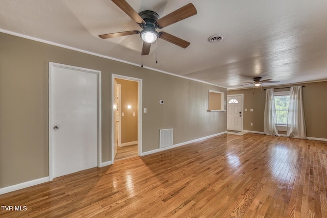 2642 Broad St, Bristol, TN 37620 - unfurnished living room with a ceiling fan, light wood-type flooring, and ornamental molding