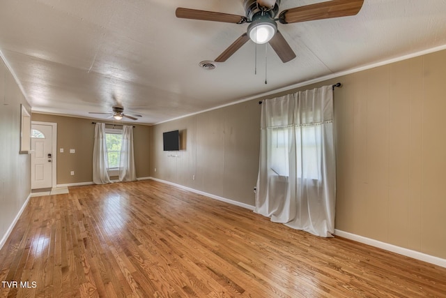 2642 Broad St, Bristol, TN 37620 - unfurnished room with ceiling fan, light wood-style floors, and ornamental molding