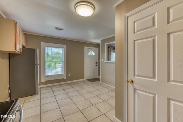 2642 Broad St, Bristol, TN 37620 - foyer entrance with light tile patterned floors and ornamental molding