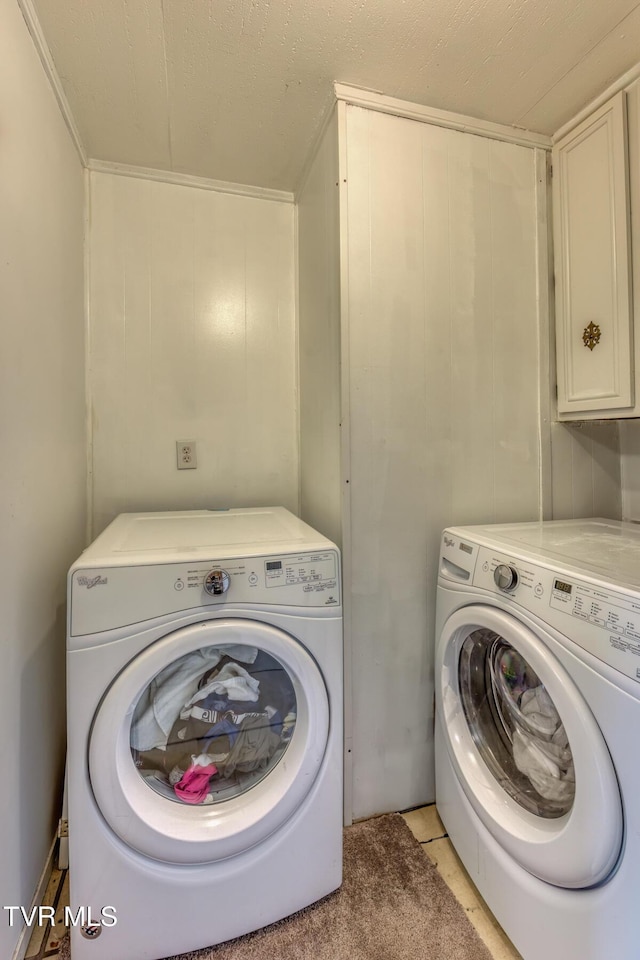 2642 Broad St, Bristol, TN 37620 - laundry area with cabinet space, separate washer and dryer, and ornamental molding