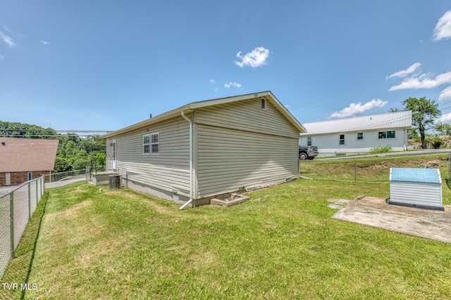 2642 Broad St, Bristol, TN 37620 - view of side of home with crawl space and a central AC unit