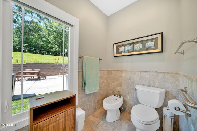 788 Watauga Rd, Watauga, TN 37694 - bathroom featuring a bidet, tile walls, tile patterned floors, and wainscoting
