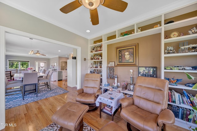 788 Watauga Rd, Watauga, TN 37694 - living area featuring a ceiling fan, crown molding, light wood-style floors, and built in shelves