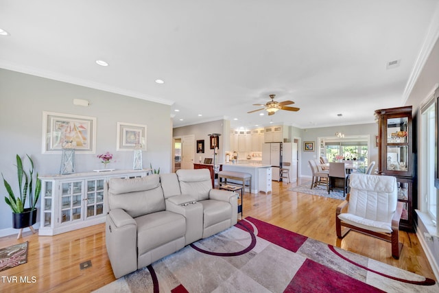 788 Watauga Rd, Watauga, TN 37694 - living area featuring light wood-style floors, ornamental molding, ceiling fan, and recessed lighting