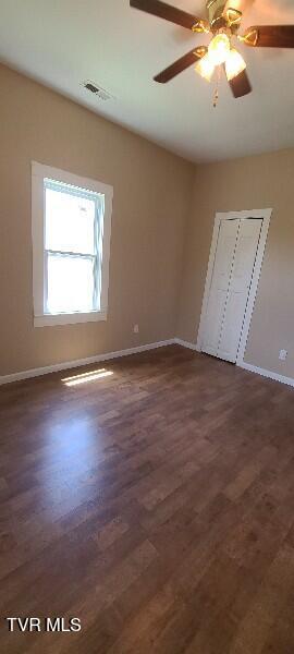 1814 Park St, Kingsport, TN 37664 - spare room featuring dark wood-style flooring and ceiling fan