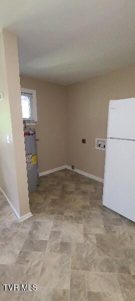 1814 Park St, Kingsport, TN 37664 - laundry area with electric water heater and washer hookup