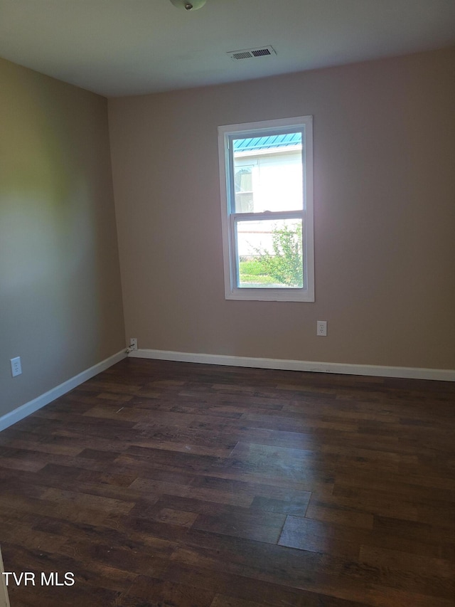 1814 Park St, Kingsport, TN 37664 - spare room with dark wood-style floors