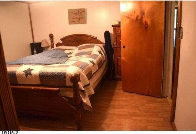 500 Guy Lloyd Rd, Erwin, TN 37650 - bedroom with wood finished floors