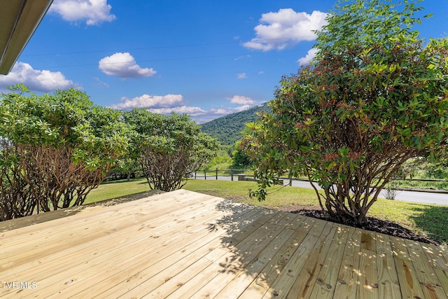 119 Orchard Meadows Ln, Roan Mountain, TN 37687 - wooden deck featuring a yard and a mountain view